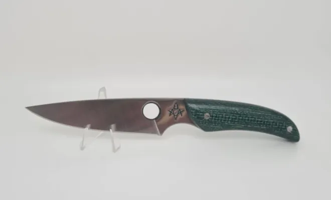 L' Officier couteau d' office, manche micarta vert